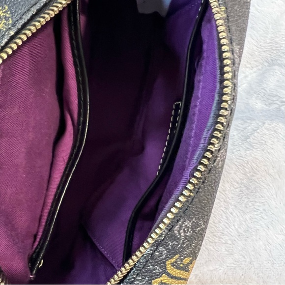 Dooney & Bourke Disney Park
Haunted Mansion 50th
Anniversary Bag Crossbody Purse - Picture 11 of 16